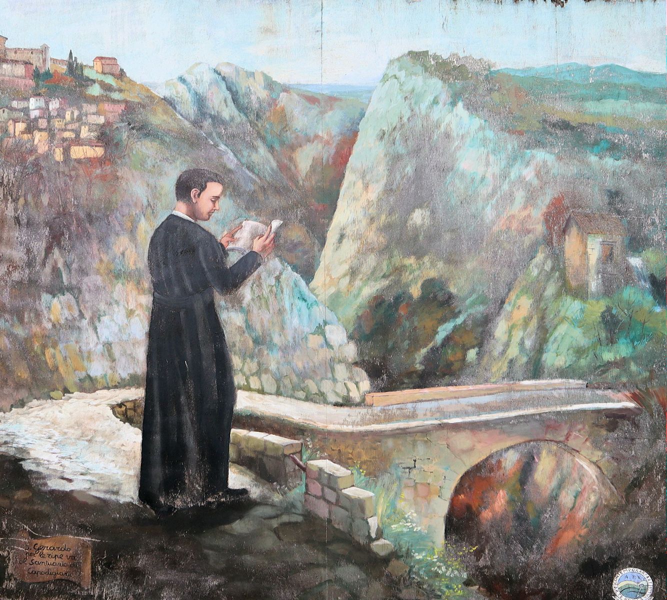 Wandbild: Gerhard blickt über die Schlucht vor seinem Haus auf das Sanktuarium Madonna di Capodigiano